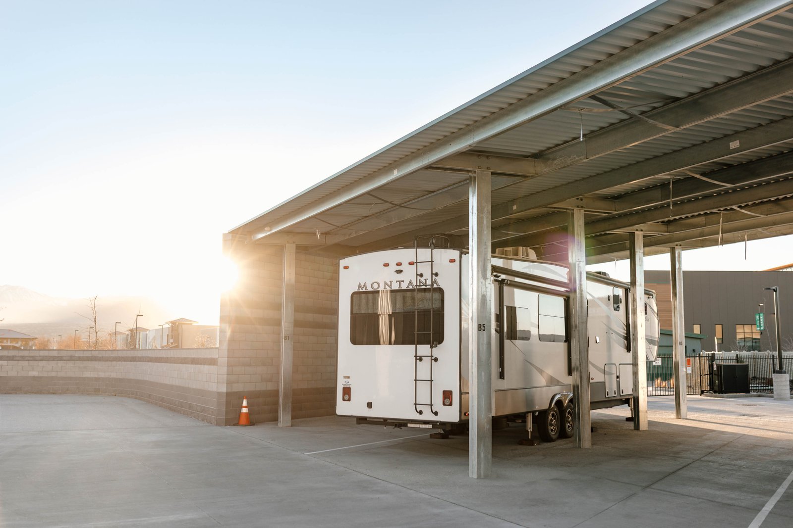An RV Parked Under A Covered Storage Spot